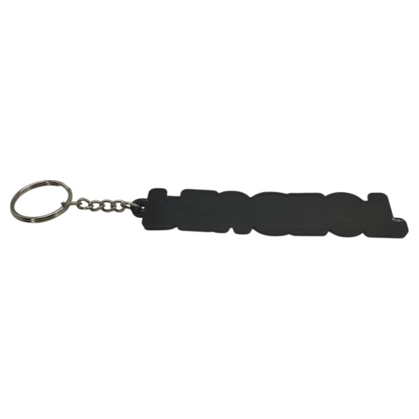 Un porte-clé robuste avec lettrage gris sur fond noir, fidèle aux badges arrière des Peugeot.
