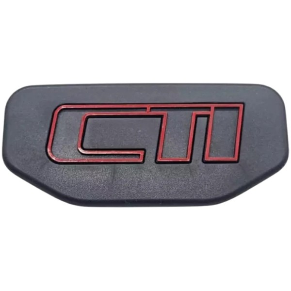Insigne de centre de volant. Noir ou gris. Fixation picots. CTI rouge.