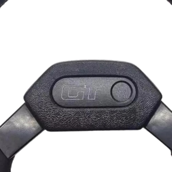 Insigne de volant GT pour 205. Plastique ABS. Fixation picots. Reproduction fidèle.