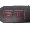 Centre de volant insigne spécifique pour Peugeot 205 GTI année 1984.